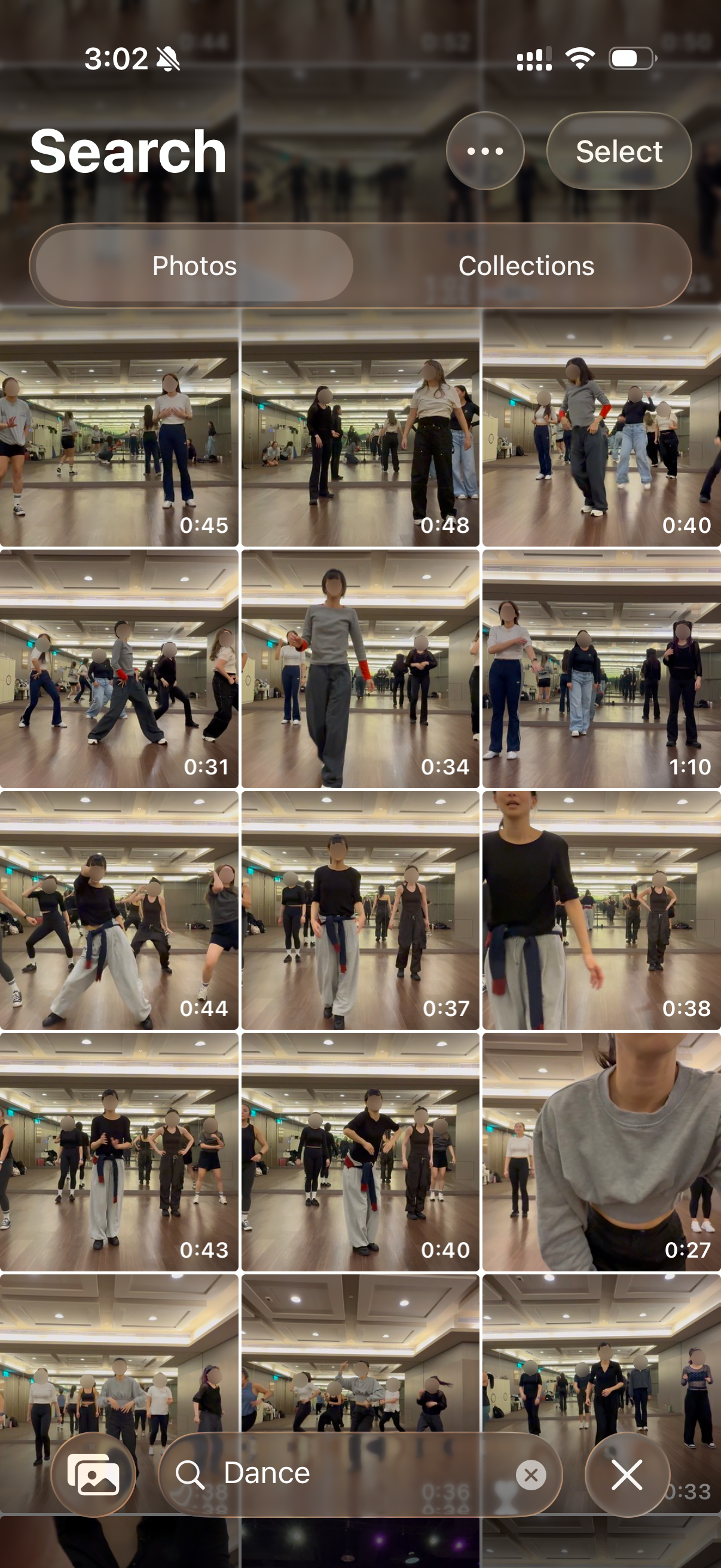 iPhone Photos library searched for “Dance” — a grid of nearly identical dance-studio video thumbnails, each labeled only with its duration.